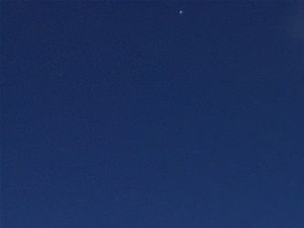 Lisbeth Friberg i Antarktis, Mt. Vinson er den høyeste toppen i bakgrunnen.